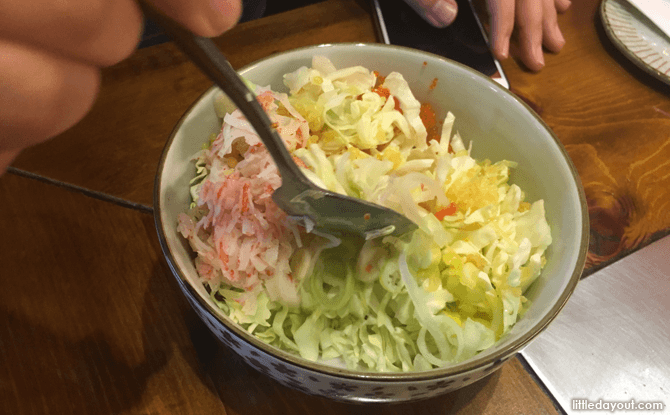 Mixing up the okonomiyaki ingredients