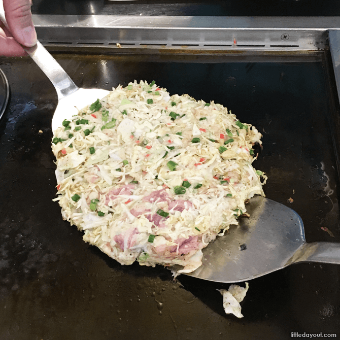 Flipping the okonomiyaki