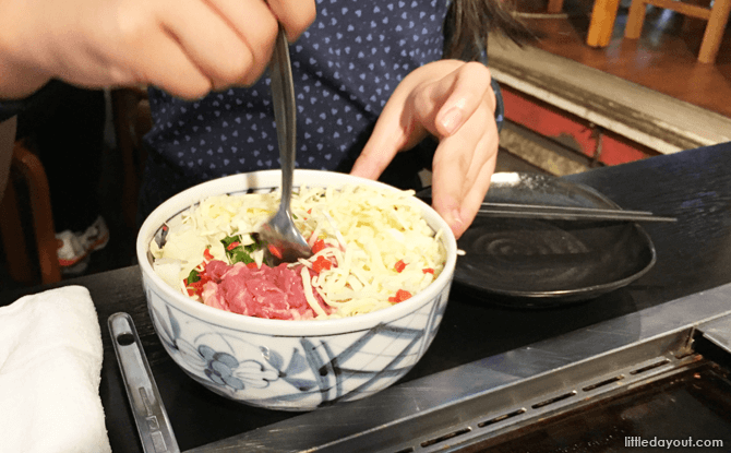 DIY Okonomiyaki: Mixing up the ingredients at Sakura Tei