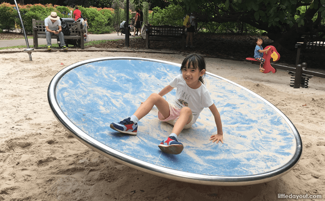 Disc swing at Jacob Ballas Children's Garden's sand play area