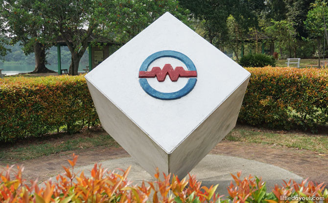 Old PUB logo on monument at Upper Peirce Reservoir Park