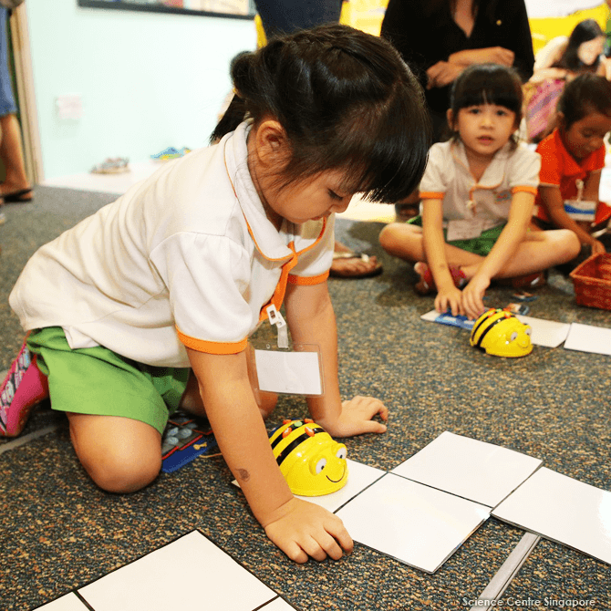 Playing with Bee-Bot at PlayMaker Studio, KidsSTOP