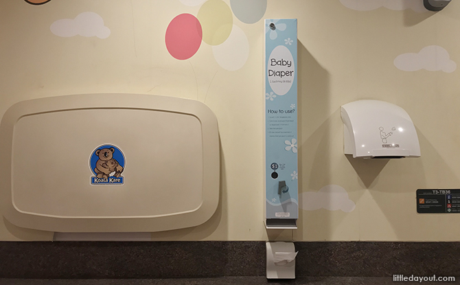 diaper changing station and diaper dispenser