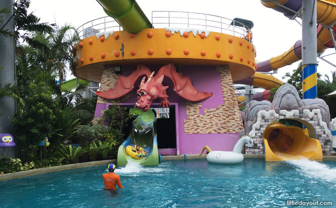 At the end of the magical ride. Lifeguards are stationed at slide exits to ensure the safety of park guests.