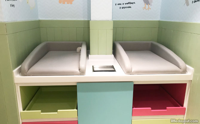 Padded diaper changing stations