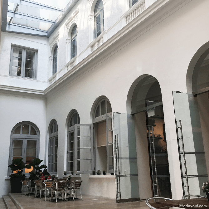 Seating area at Courtyard Cafe by OWL at National Gallery Singapore