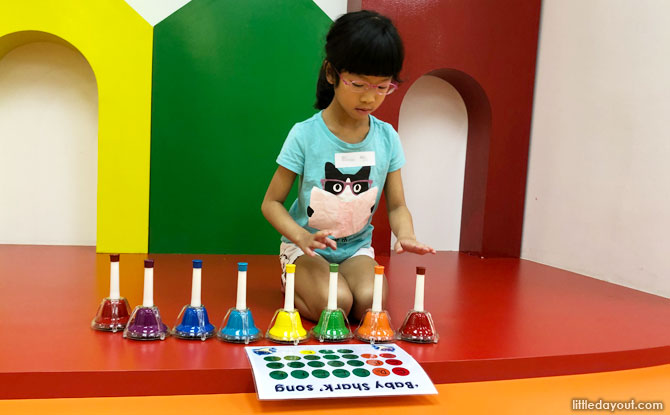 All ready to perform the Baby Shark tune that they had just learnt, on the colourful stage in the music room.