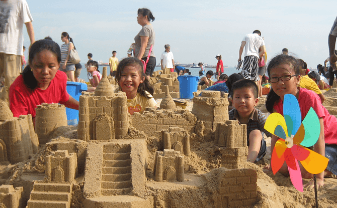 Family Sandcastle Building