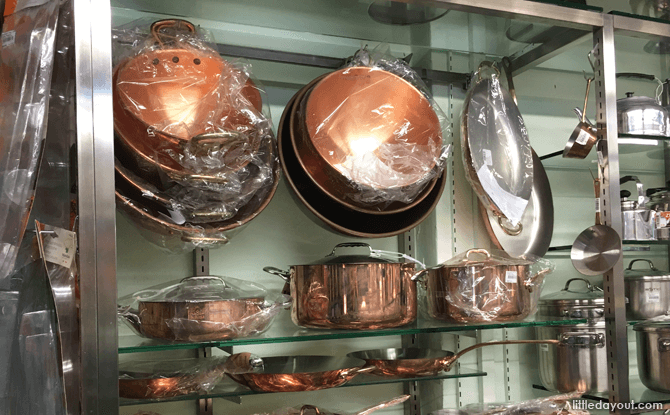 Shiny pans on display at Sia Huat