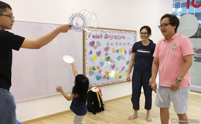 Fun bubble-catching in progress.