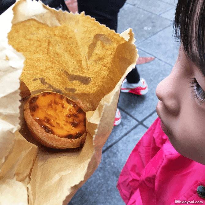 Seconds before the little one attacked the Lord Stow’s Portuguese egg tart.
