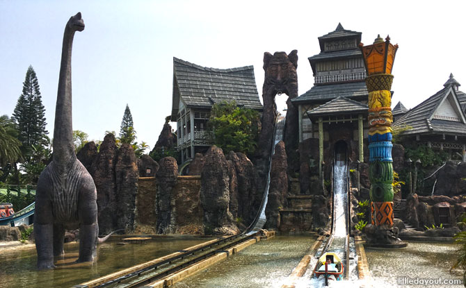 Getting a teaser on the shorter water slide before they took on the three-storey plunge