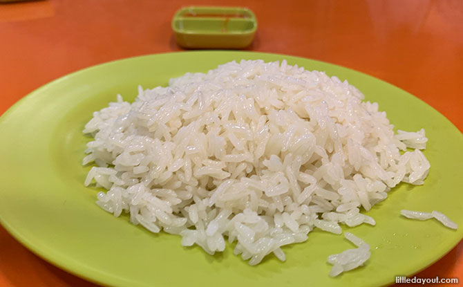 Tucking into Hainanese Delicacy Chicken Rice