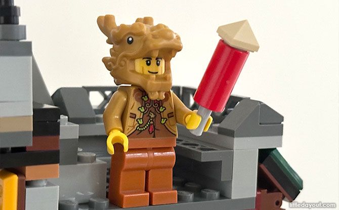 minifigure in the golden dragon costume