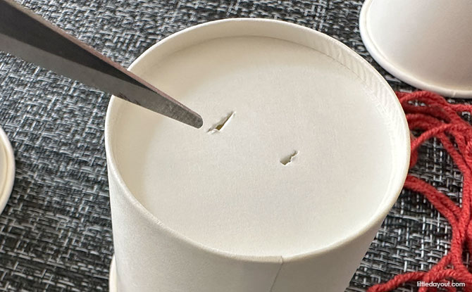 Lion Dance Craft (With Free Template) 2 Punch two holes