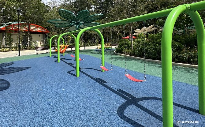 Magical Bridge Playground: Inclusive Play Inspired By Seed Dispersal At Sun Plaza Park 2 Swings at the Splitting Action Zone