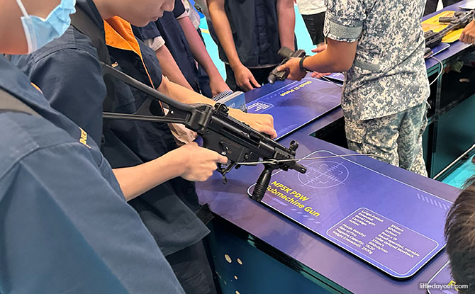 handle the weapons that elite divers use