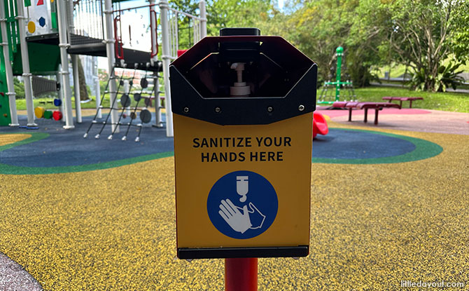 Hand sanitiser dispenser at the one-North playground