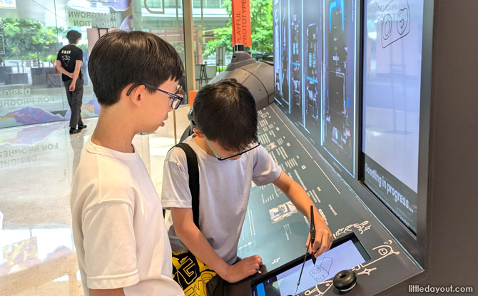 Highlights Of REINVENTION Festival At GENEO, Singapore Science Park 2 Lionsbot's design a robot booth