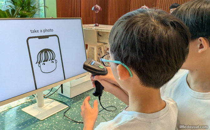 Highlights Of REINVENTION Festival At GENEO, Singapore Science Park 6 played games through scanning barcodes