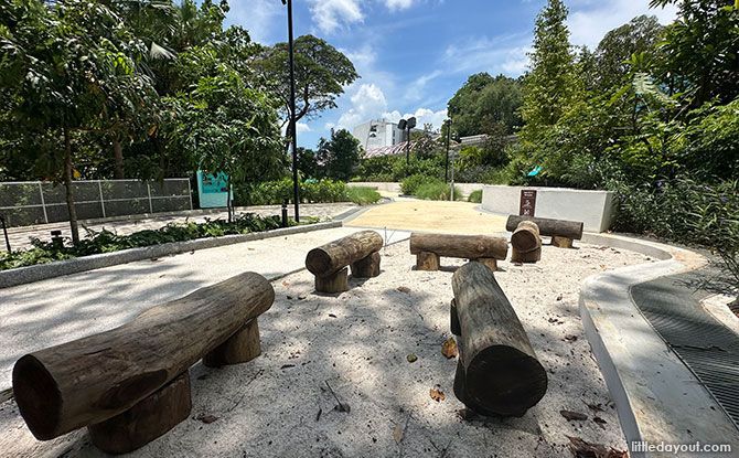 Log seats at Palate Playground