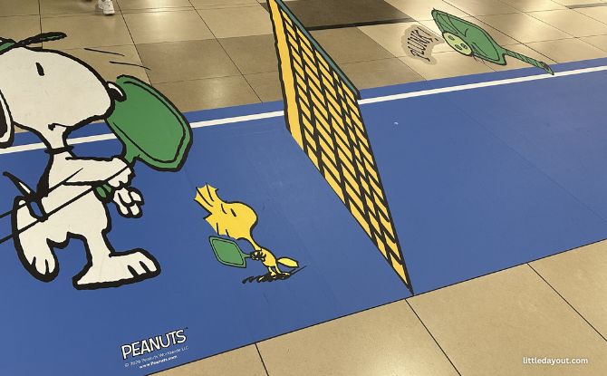 Ready, Sweat, Go! With Snoopy & His Siblings At Changi Airport: Sports Adventures From 29 May to 12 July 2026 7 Photo spot with Snoopy and Woodstock in a tennis doubles match