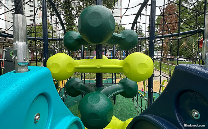 Teck Whye Gardens: Playground With Swinging Bell Swing 4 Inside the dome at the Teck Whye Garden Playground